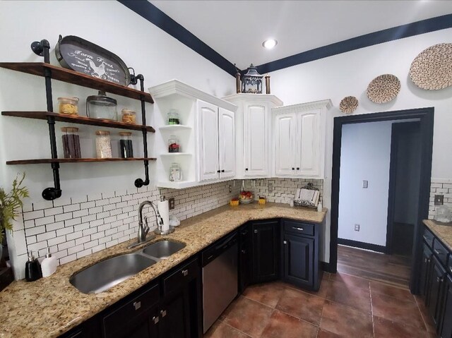 3 Rhonda Ln, Bella Vista, AR 72715 - kitchen with stainless steel dishwasher, a sink, white cabinetry, decorative backsplash, and light stone counters