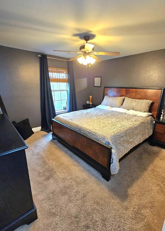 3 Rhonda Ln, Bella Vista, AR 72715 - carpeted bedroom with ceiling fan