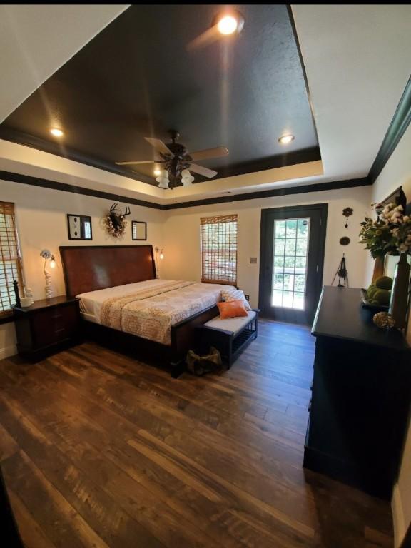 3 Rhonda Ln, Bella Vista, AR 72715 - bedroom featuring a raised ceiling, hardwood / wood-style flooring, access to exterior, ornamental molding, and ceiling fan