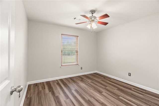 8001 Mars Hill Rd, Ar, AR 72011 - unfurnished room with wood finished floors, a ceiling fan, and baseboards