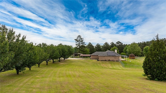 8001 Mars Hill Rd, Ar, AR 72011 - view of grassy yard featuring a detached carport