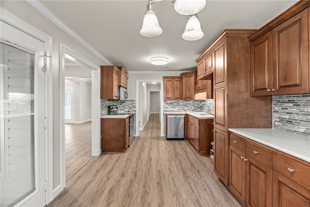 8001 Mars Hill Rd, Ar, AR 72011 - kitchen featuring appliances with stainless steel finishes, brown cabinets, light wood-style floors, decorative backsplash, and crown molding