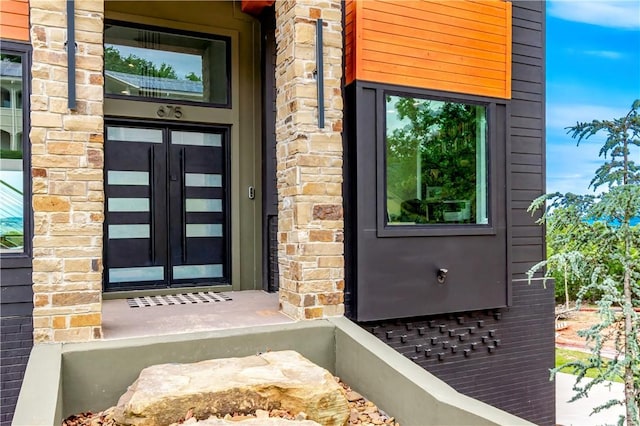 675 N Cliffside Dr, Fayetteville, AR 72701 - property entrance with stone siding and french doors