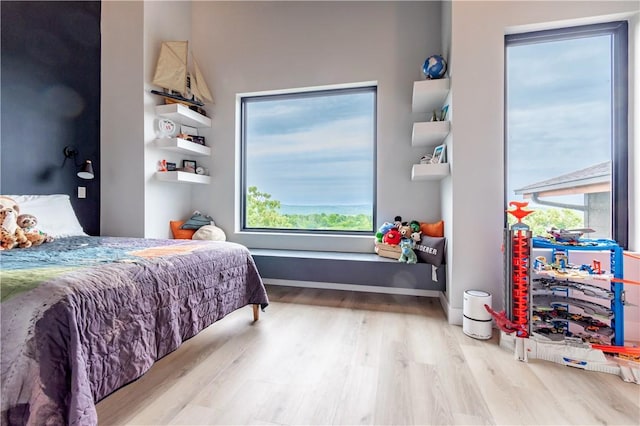 675 N Cliffside Dr, Fayetteville, AR 72701 - bedroom with wood finished floors