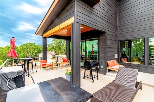 675 N Cliffside Dr, Fayetteville, AR 72701 - view of patio with an outdoor living space