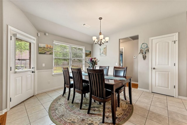 811 SW Pure Globe St, Bentonville, AR 72712 - dining area with a chandelier, light tile patterned floors, and baseboards