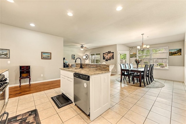 811 SW Pure Globe St, Bentonville, AR 72712 - kitchen with stainless steel dishwasher, a sink, recessed lighting, light tile patterned floors, and a chandelier