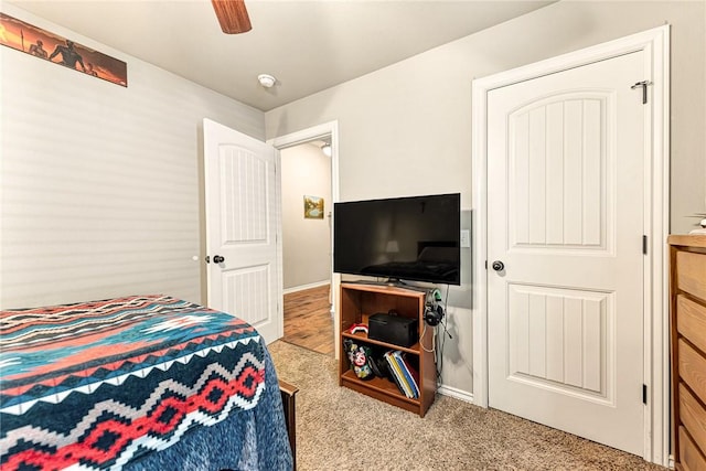 811 SW Pure Globe St, Bentonville, AR 72712 - carpeted bedroom featuring baseboards and ceiling fan
