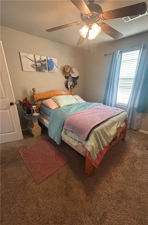 811 SW Pure Globe St, Bentonville, AR 72712 - bedroom with carpet floors and ceiling fan
