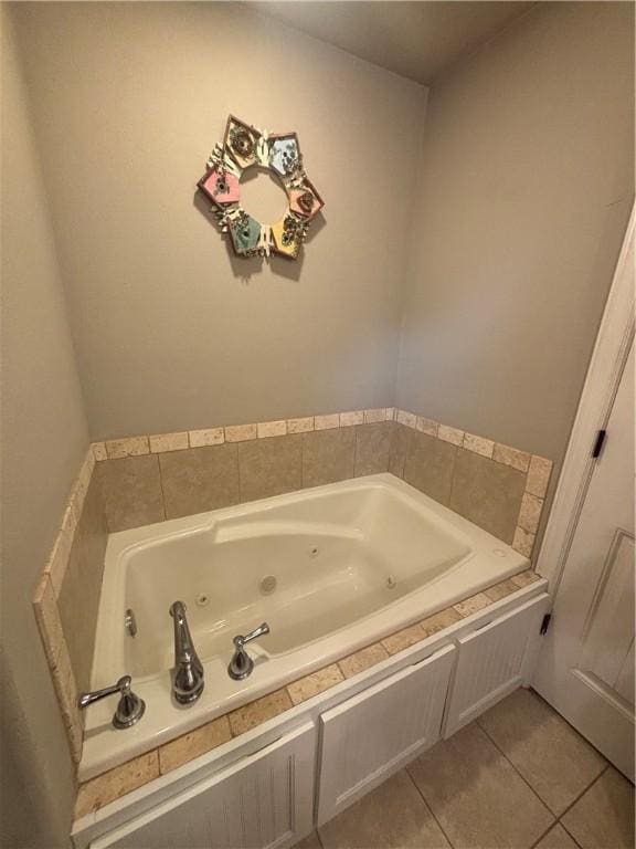 811 SW Pure Globe St, Bentonville, AR 72712 - bathroom with a whirlpool tub and tile patterned floors