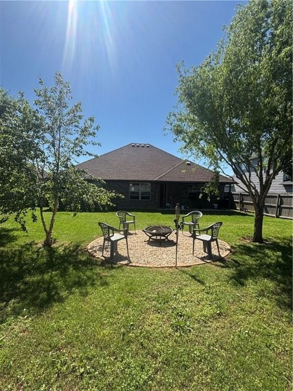 811 SW Pure Globe St, Bentonville, AR 72712 - view of yard featuring an outdoor fire pit