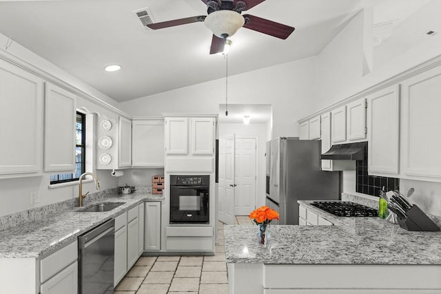 1110 Meadowlark Ln, Siloam Springs, AR 72761 - kitchen featuring oven, a sink, dishwashing machine, vaulted ceiling, and gas cooktop