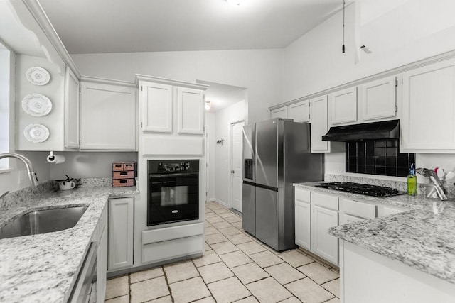 1110 Meadowlark Ln, Siloam Springs, AR 72761 - kitchen with black oven, stainless steel refrigerator with ice dispenser, gas cooktop, under cabinet range hood, and lofted ceiling