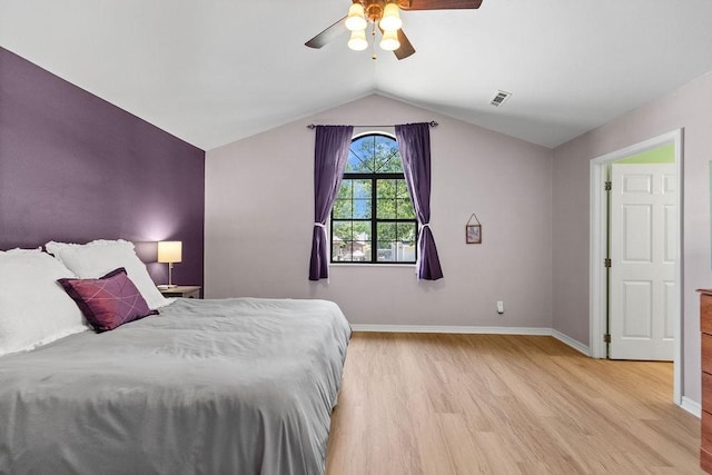 1110 Meadowlark Ln, Siloam Springs, AR 72761 - bedroom featuring light wood-style floors, lofted ceiling, baseboards, and ceiling fan