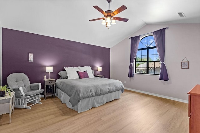 1110 Meadowlark Ln, Siloam Springs, AR 72761 - bedroom featuring wood finished floors, vaulted ceiling, baseboards, and a ceiling fan