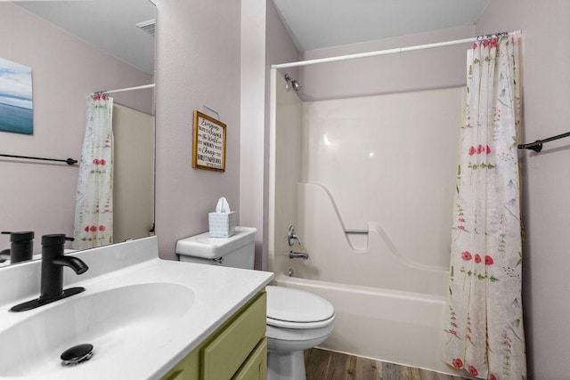 1110 Meadowlark Ln, Siloam Springs, AR 72761 - full bath featuring vanity, shower / bath combo, toilet, and wood finished floors