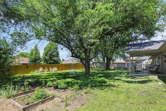 1110 Meadowlark Ln, Siloam Springs, AR 72761 - view of yard featuring a garden and a patio