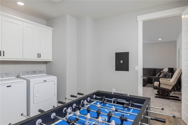 2762 Wilson Ln, Fayetteville, AR 72703 - recreation room with electric panel, washer and clothes dryer, wood finished floors, and recessed lighting