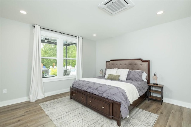 2762 Wilson Ln, Fayetteville, AR 72703 - bedroom featuring light wood finished floors, baseboards, and recessed lighting