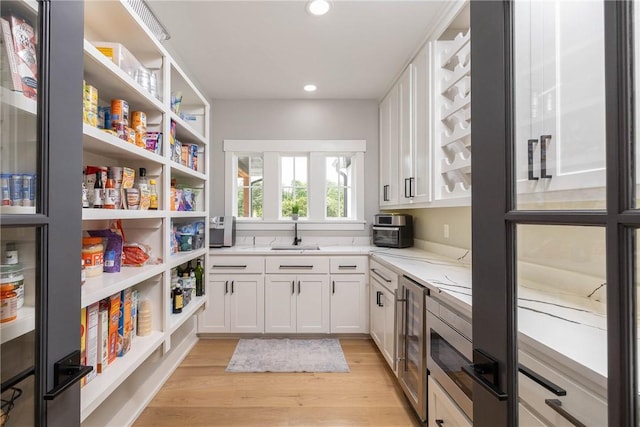 2762 Wilson Ln, Fayetteville, AR 72703 - storage area with wine cooler and a sink