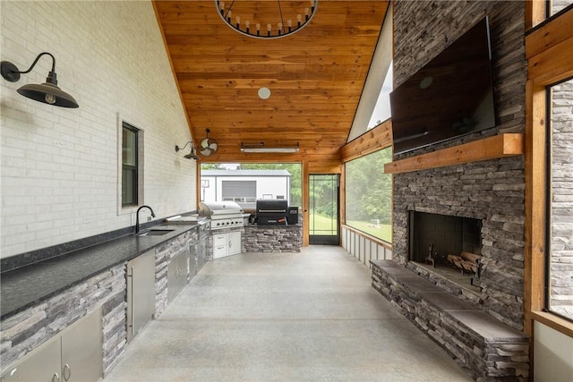 2762 Wilson Ln, Fayetteville, AR 72703 - view of patio featuring a sink and an outdoor stone fireplace