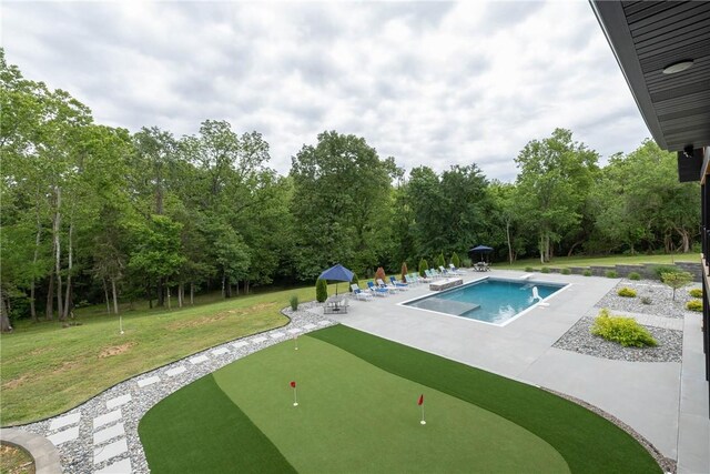 2762 Wilson Ln, Fayetteville, AR 72703 - outdoor pool featuring a putting green, a patio, a diving board, and a lawn