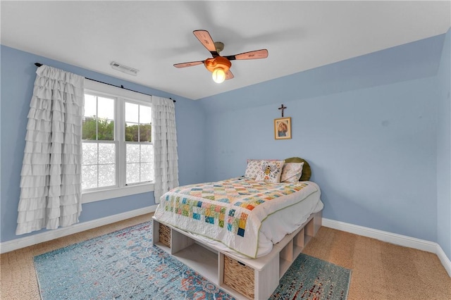 12292 Butler Rd, Prairie Grove, AR 72753 - carpeted bedroom with baseboards and ceiling fan