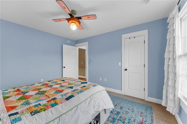 12292 Butler Rd, Prairie Grove, AR 72753 - carpeted bedroom featuring baseboards and a ceiling fan
