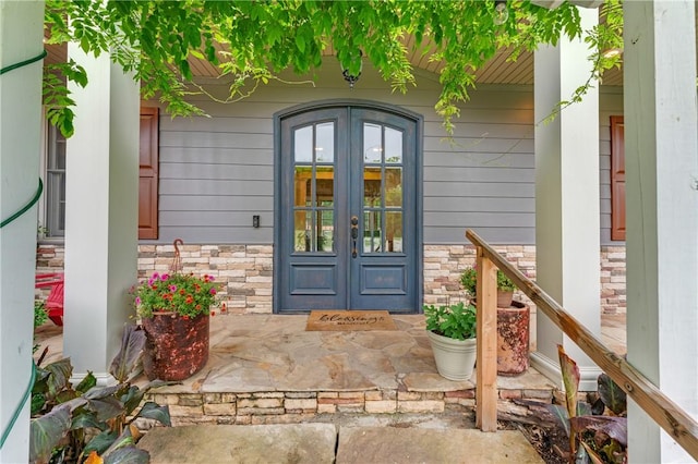 12292 Butler Rd, Prairie Grove, AR 72753 - doorway to property featuring french doors and stone siding