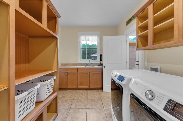 12292 Butler Rd, Prairie Grove, AR 72753 - laundry room with washer and dryer, a sink, and light tile patterned floors