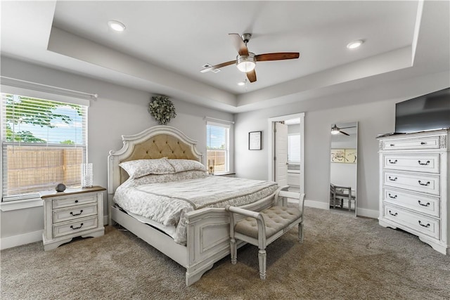 6 Briscoe Ln, Bella Vista, AR 72715 - carpeted bedroom featuring multiple windows, a raised ceiling, baseboards, recessed lighting, and a ceiling fan
