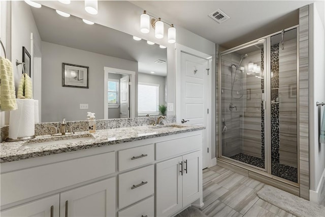 6 Briscoe Ln, Bella Vista, AR 72715 - bathroom featuring double vanity and a stall shower