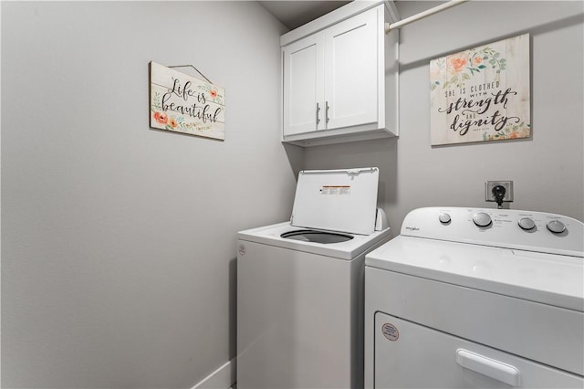 6 Briscoe Ln, Bella Vista, AR 72715 - laundry room with cabinet space and washer and clothes dryer