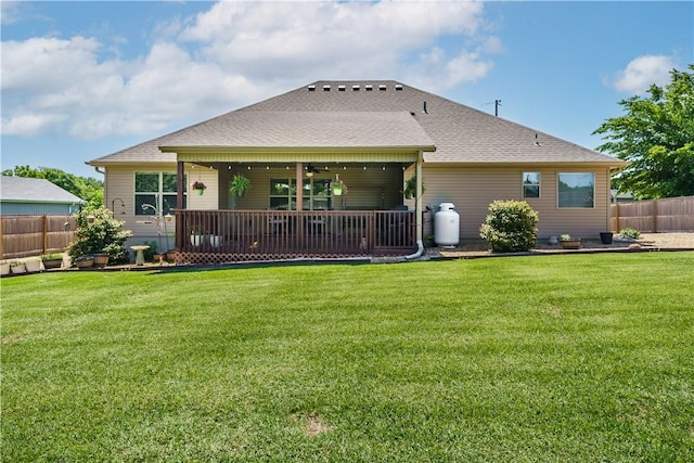6 Briscoe Ln, Bella Vista, AR 72715 - back of property featuring ceiling fan and a shingled roof