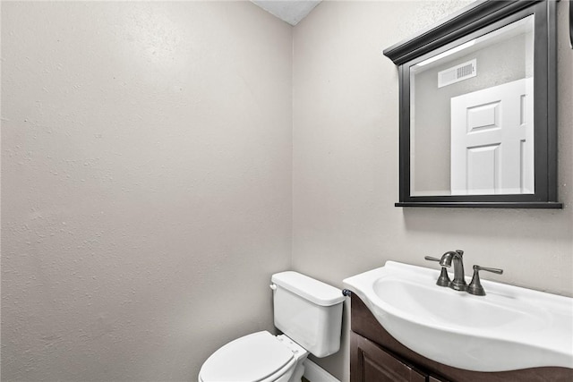 14090 Canal St, Rogers, AR 72758 - bathroom featuring vanity and toilet