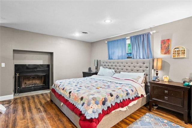 14090 Canal St, Rogers, AR 72758 - bedroom featuring wood finished floors, recessed lighting, a fireplace, and baseboards