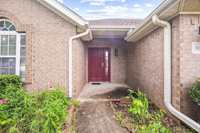 809 Irelan, Lowell, AR 72745 - entrance to property with brick siding and roof with shingles
