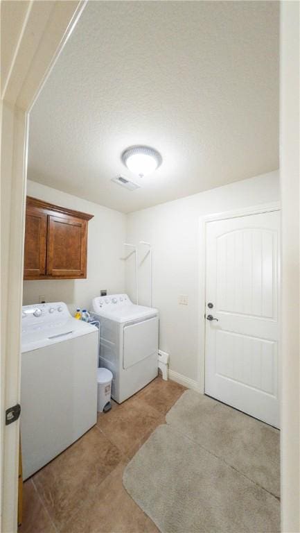 1011 Harvest St, Centerton, AR 72719 - laundry room with washing machine and clothes dryer and cabinet space