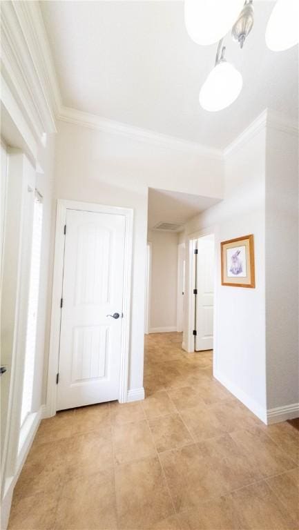 1011 Harvest St, Centerton, AR 72719 - hall with crown molding and light tile patterned flooring