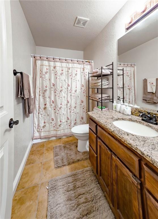 1011 Harvest St, Centerton, AR 72719 - bathroom featuring vanity, a shower with curtain, tile patterned flooring, and a textured ceiling