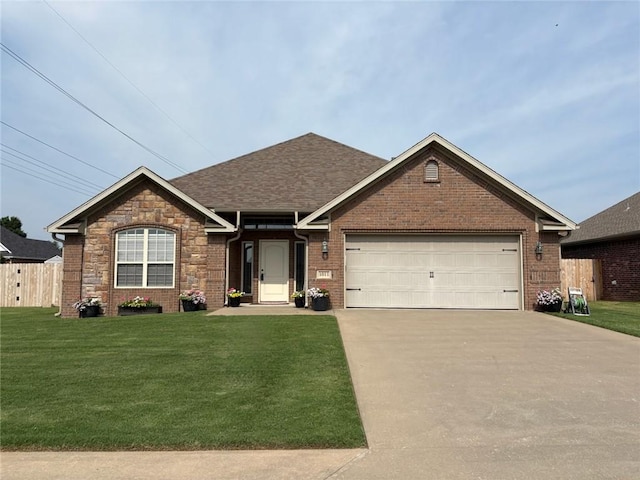 1011 Harvest St, Centerton, AR 72719 - ranch-style house with driveway, an attached garage, brick siding, a shingled roof, and stone siding