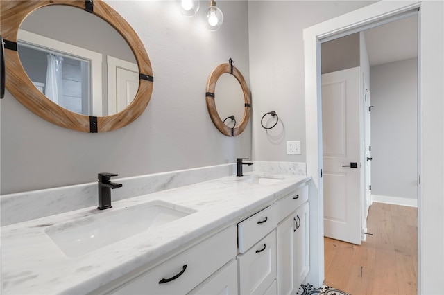 1408 SW Breeze Ct, Bentonville, AR 72713 - full bathroom with double vanity and wood finished floors