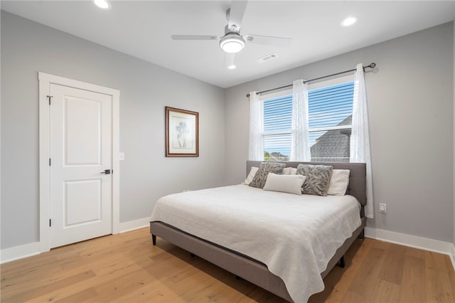 1408 SW Breeze Ct, Bentonville, AR 72713 - bedroom with baseboards, light wood finished floors, recessed lighting, and ceiling fan