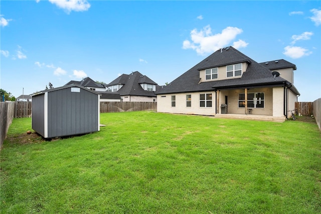 1408 SW Breeze Ct, Bentonville, AR 72713 - rear view of house with a patio and roof with shingles