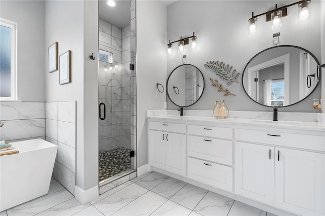 1408 SW Breeze Ct, Bentonville, AR 72713 - full bathroom featuring marble finish floors, a stall shower, double vanity, a freestanding tub, and recessed lighting