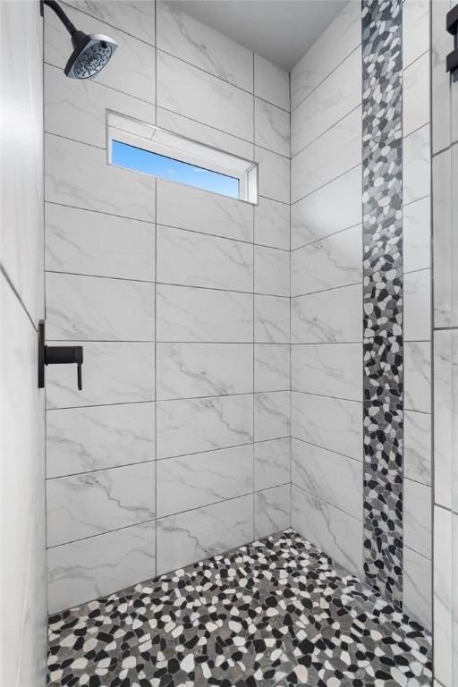1408 SW Breeze Ct, Bentonville, AR 72713 - bathroom featuring a tile shower