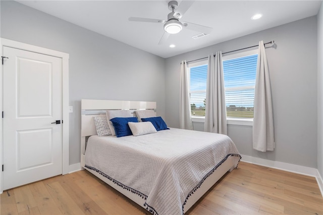 1408 SW Breeze Ct, Bentonville, AR 72713 - bedroom featuring light wood-type flooring, baseboards, recessed lighting, and a ceiling fan