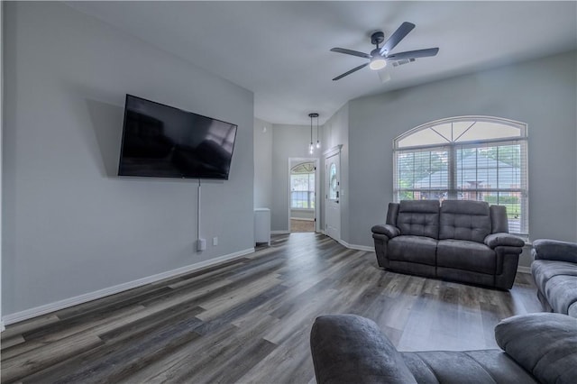 411 Kate Dr, Centerton, AR 72719 - living area featuring wood finished floors, ceiling fan, and baseboards