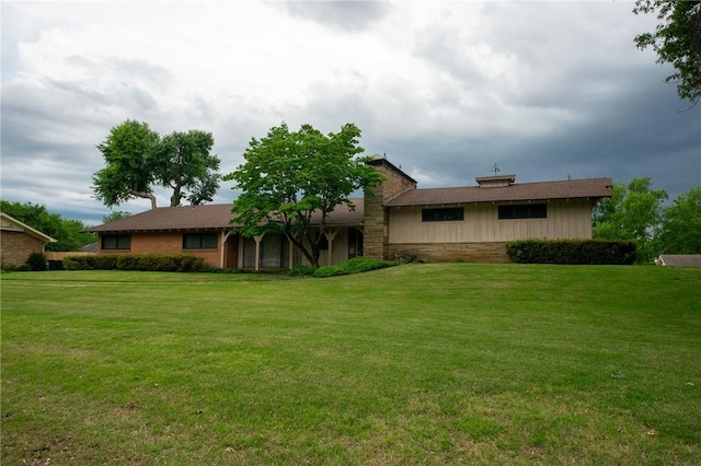 1617 Ranch Dr, Springdale, AR 72762 - back of property featuring a yard