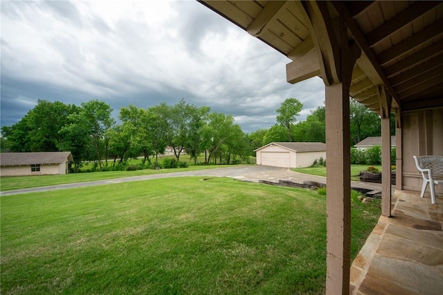 1617 Ranch Dr, Springdale, AR 72762 - view of green lawn with an outbuilding and a detached garage